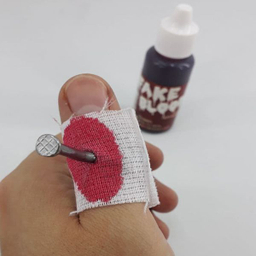 ابزار شوخی دنیای سرگرمی های کمیاب مدل میخ و باند و خون سرکاری بسته 2 عددی