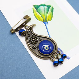 گل سینه پیکسلی طرح چشم نظر