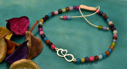 دستبند طلای 18 عیار آمانژ گالری طره بینهایت و قلب مدل 003001