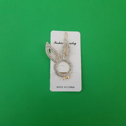 گیره دخترانه مدل خرگوش نگین دار رنگ طلایی