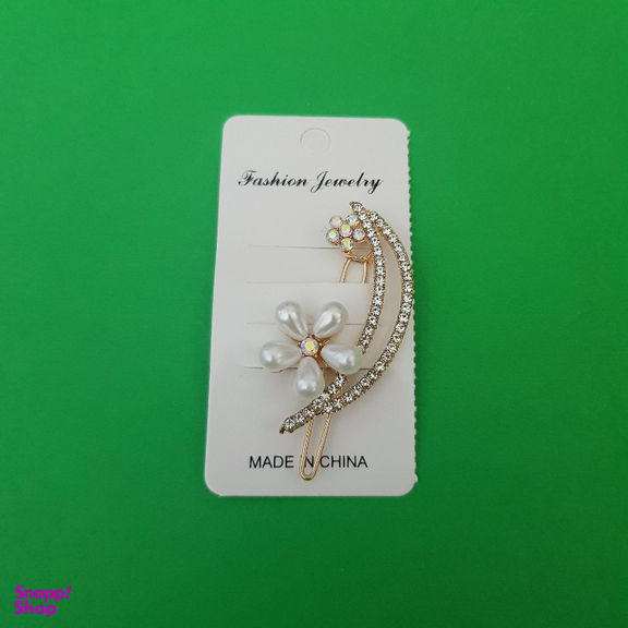 گیره دخترانه مدل گل نگین دار رنگ طلایی