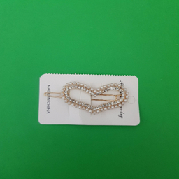 گیره دخترانه مدل قلب نگین دار رنگ طلایی