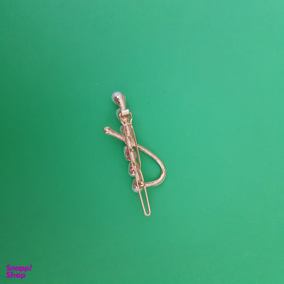 گیره دخترانه مدل مروارید و نگین رنگ طلایی