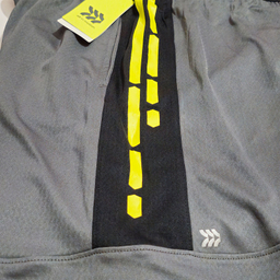 شلوارک ورزشی پسرانه آل این موشن مدل SEP-AULA0027 رنگ طوسی