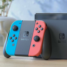 کنسول بازی نینتندو سوییچ اولد به همراه Joy-Con رنگی قرمز و آبی