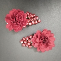 گیره مو دخترانه مدل گل پرچمی مجموعه دو عددی