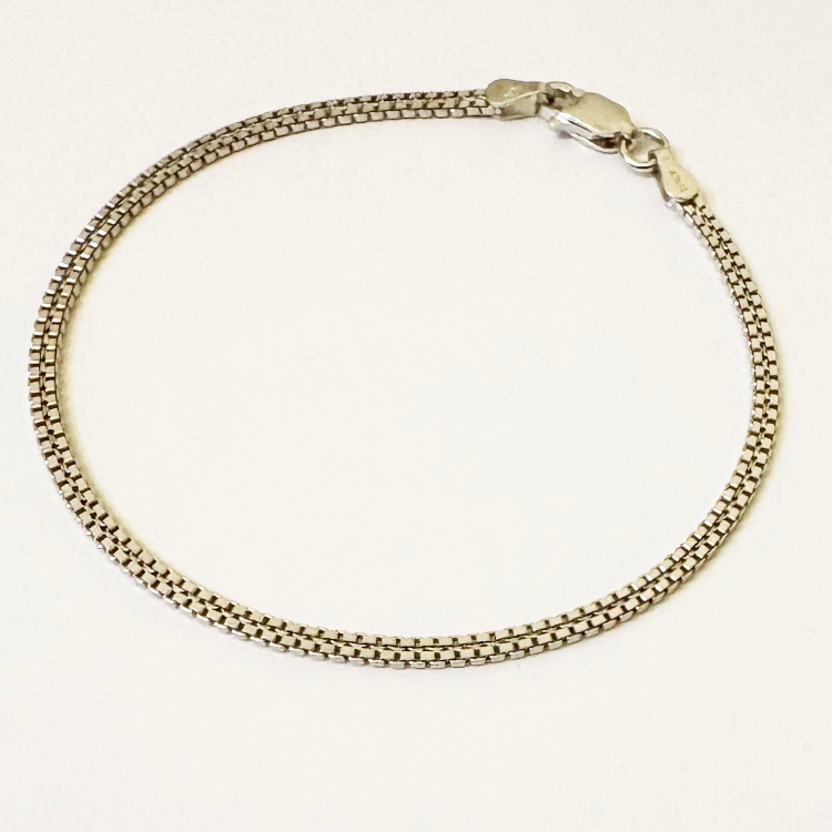 دستبند نقره زنانه گیرا مدل G0581 طرح بافت