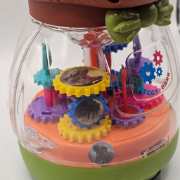 اسباب بازی ناب سل مدل چرخ دنده ای قلک طرح دایناسور موزیکال