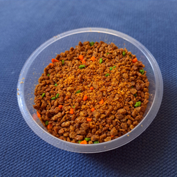 غذای مرغ مینا آوس تروپیکن مدل فلوریوا وزن 453 گرم