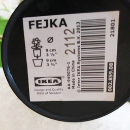 گلدان ایکیا مدل FEJKA کد 002.859.08 به همراه گل مصنوعی