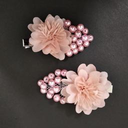 گیره مو دخترانه مدل گل پرچمی مجموعه دو عددی