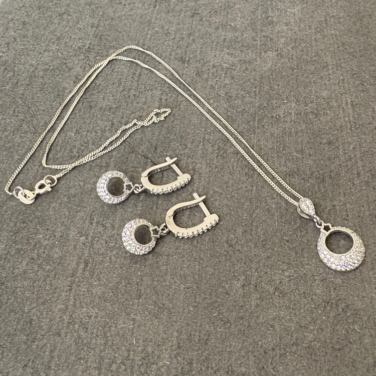 نیم ست نقره زنانه گیرا مدل راند کد G976