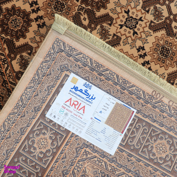 فرش ماشینی بزرگمهر طرح بلوچی کد 78001 رنگ زمینه قهوه‌ای