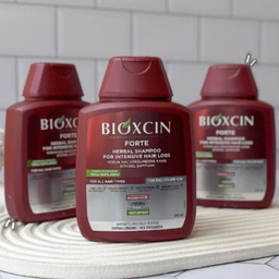 شامپو مو ضد ریزش مو و تقویت کننده مو بیوکسین مدل Forte Herbal shampoo حجم 300 میلی‌لیتر