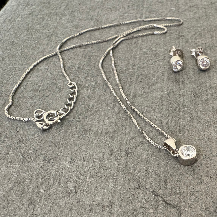 نیم ست نقره زنانه گیرا مدل راند کد G977