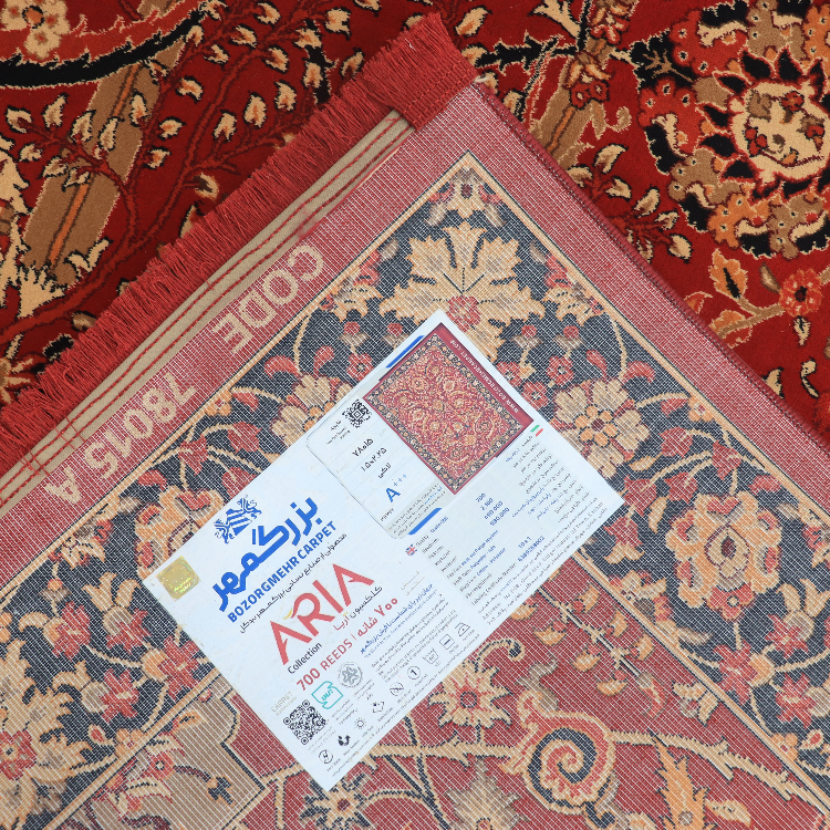 فرش ماشینی بزرگمهر طرح بلوچی کد 78015 رنگ زمینه قرمز
