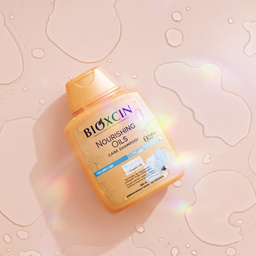 شامپو ضد ریزش مو بیوکسین مدل Nourishing Oils حجم 300 میلی لیتر