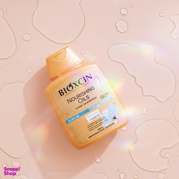 شامپو ضد ریزش مو بیوکسین مدل Nourishing Oils حجم 300 میلی لیتر