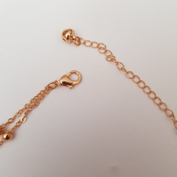 پابند زنانه دو رج طرح ستاره و گوی رنگ طلایی